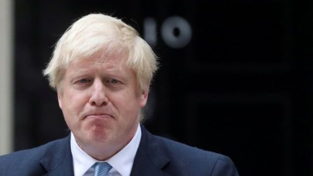 Karas JK parlamente: B. Johnsonas grasina pirmalaikiais rinkimais