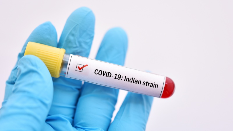 JK mokslininkai: su indiškąja koronaviruso atmaina siejamas galvos skausmas ir bėganti nosis